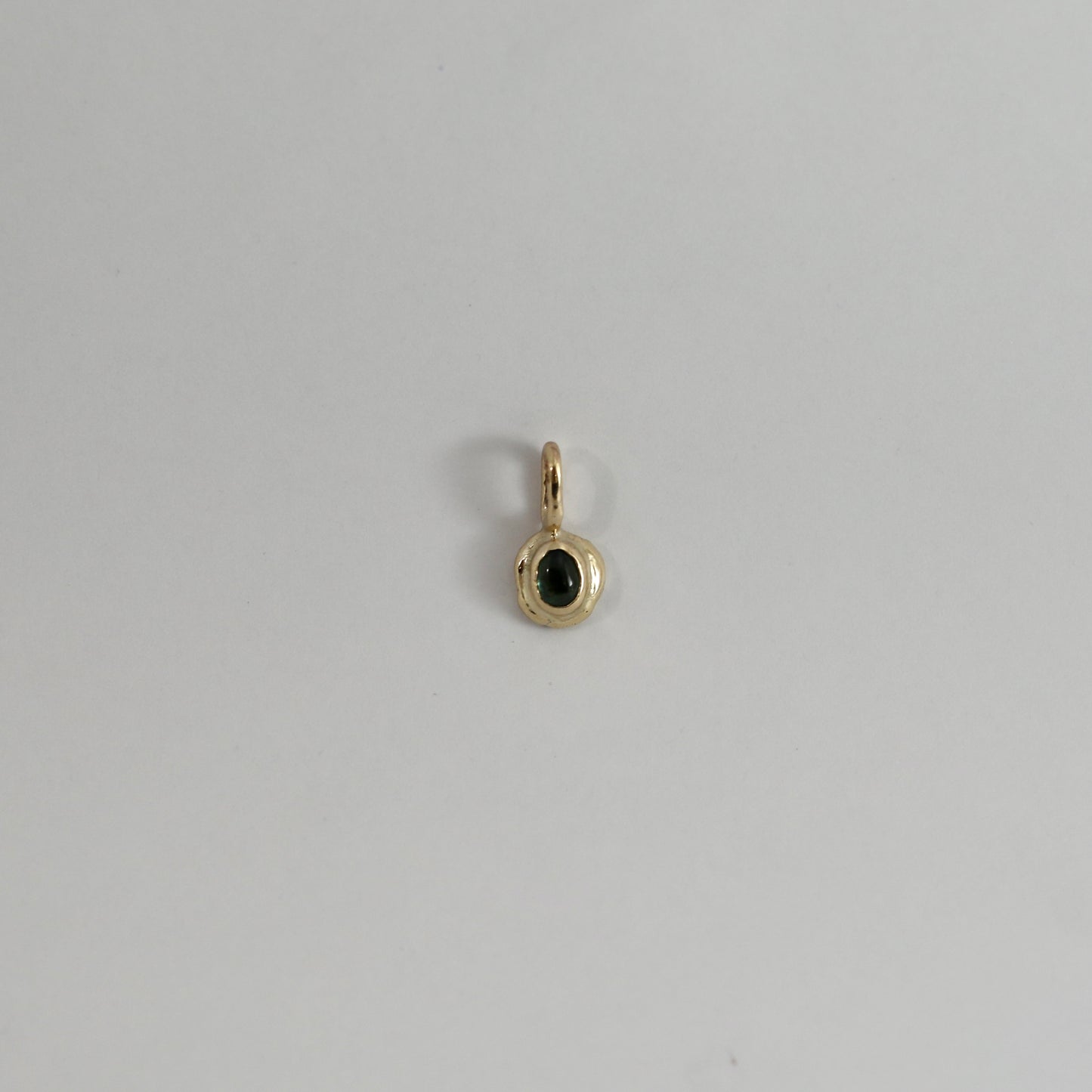 Gold & sapphire charm