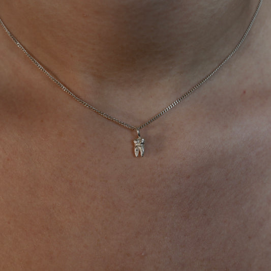 Tooth charm